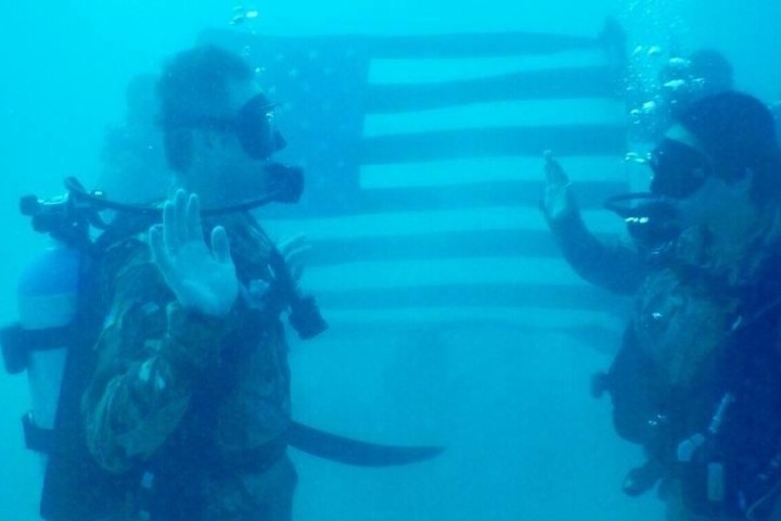 a person swimming underwater