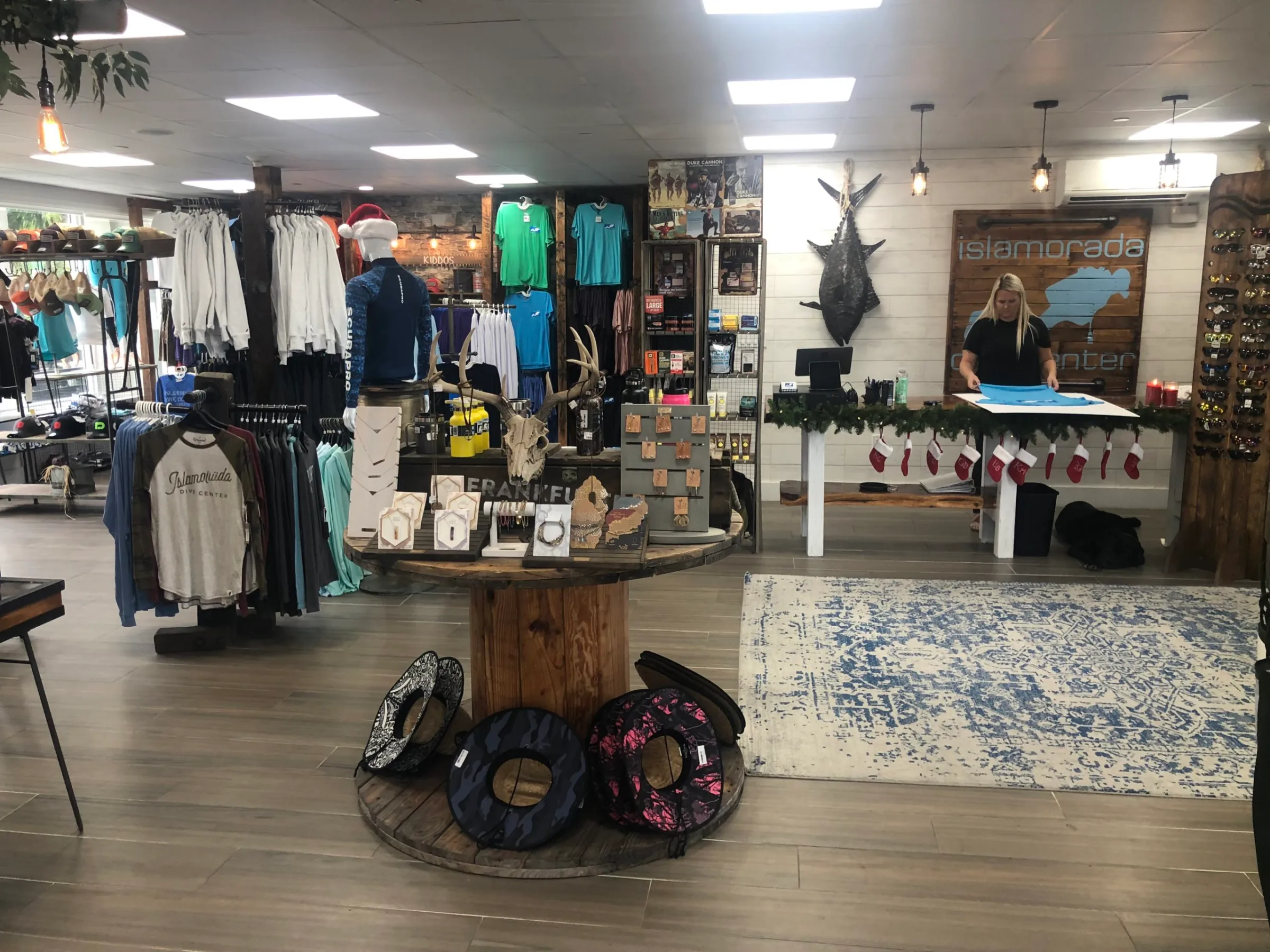 a store filled with lots of people in a room