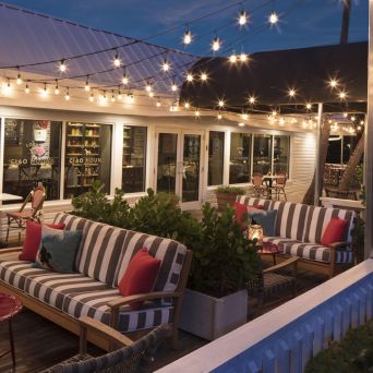 a dining room table in front of a building